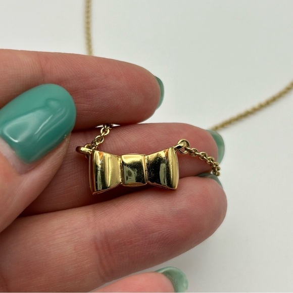 Kate Spade Gold Tone Chain with White Enamel Bow Ribbon Charm Short Necklace 19" - Picture 6 of 10